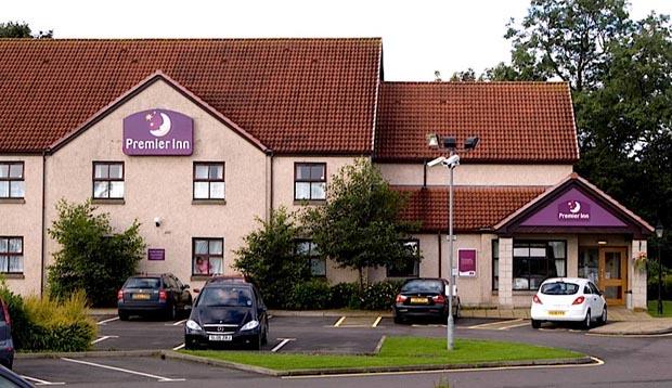 Exterior of Premier Inn Hotel Falkirk East showing car park