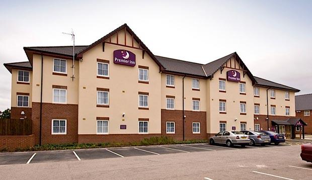 Exterior of Premier Inn Coventry East (M6,Jct2) with car park view