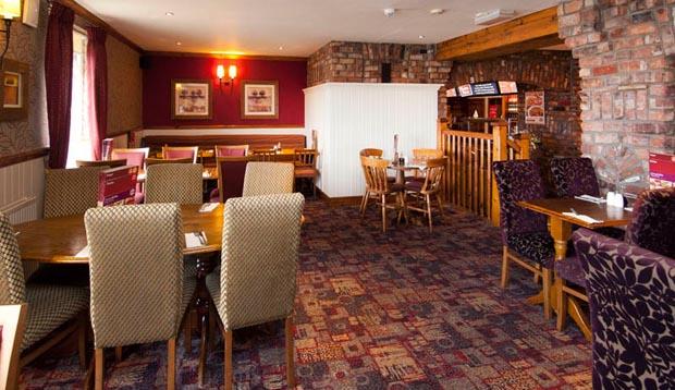 Restaurant area at Premier Inn Llanelli Central West hotel