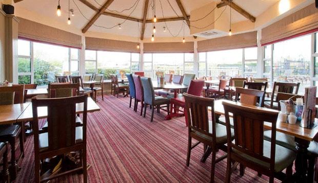 Restaurant area showing tables and chairs at Premier Inn Mansfield hotel