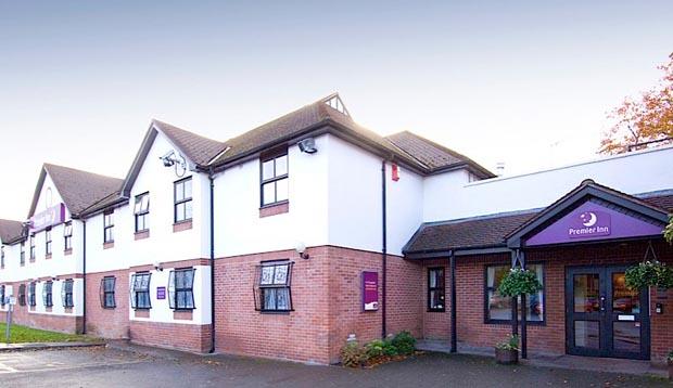 Exterior at Premier Inn Manchester Airport (Heald Green) hotel showing reception