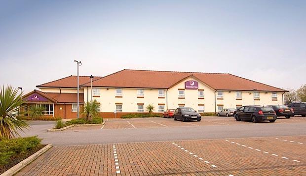 Exterior of Premier Inn Oldham Central showing car park