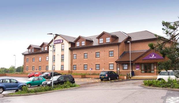 Exterior of Premier Inn Ripley showing car park