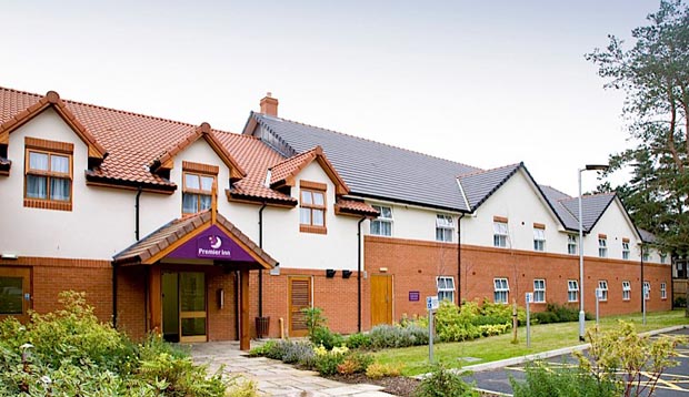 Exterior of Premier Inn Thetford showing front gardens